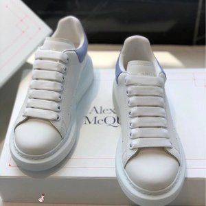 Alexander McQueen elegant white with blue tail